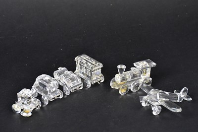 Lot 246 - SWAROVSKI; six crystal vehicles, comprising...