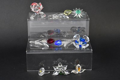 Lot 223 - SWAROVSKI; a collection of crystal flowers, to...