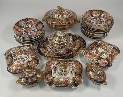 Lot 167 - IMARI; a part dinner service comprising an...