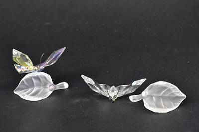 Lot 247 - SWAROVSKI; two crystal insects, comprising...
