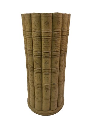 Lot 33 - A umbrella/stick stand on the form of a set of...