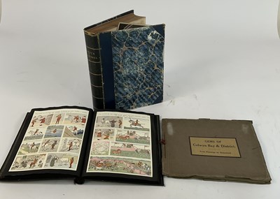 Lot 345 - A book of black and white Punch cartoons, part...