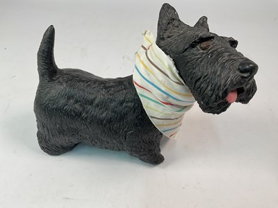 Lot 24 - A 20th century resin Scottish terrier, height...