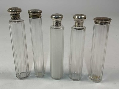 Lot 579 - Five 20th century hallmarked silver topped...