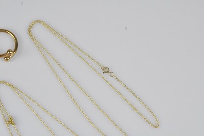 Lot 24 - A yellow metal Chinese pendant, a yellow metal...
