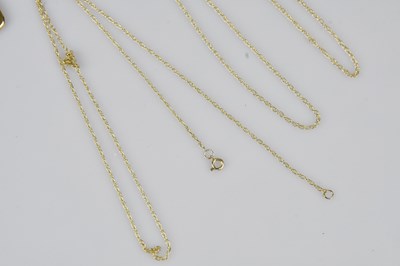 Lot 24 - A yellow metal Chinese pendant, a yellow metal...