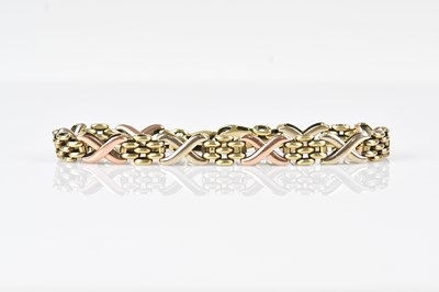 Lot 44 - A 9ct tricolour gold fancy link bracelet,...