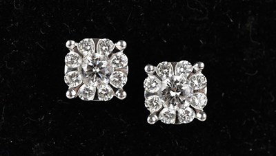 Lot 168 - A pair of white metal diamond set ear studs,...