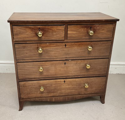 Lot 124 - An early 19th century mahogany chest, with two...