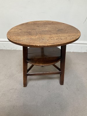 Lot 71 - An 18th century vernacular oak cricket table,...