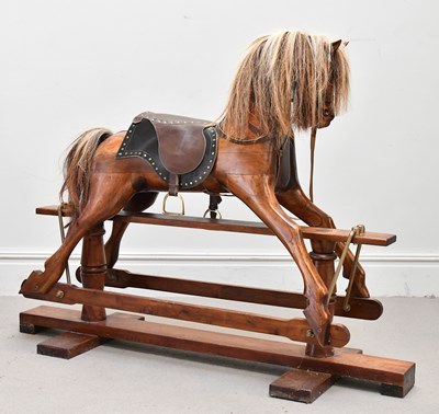 Lot 1798 - A mahogany rocking horse, height 110cm, length...