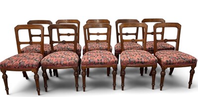 Lot 56 - A set of ten Edwardian oak dining chairs, on...