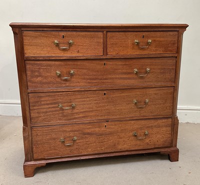 Lot 144 - A George III mahogany chest of two short and...