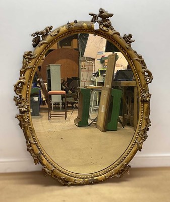Lot 648 - A 19th century gilt surround oval wall mirror,...