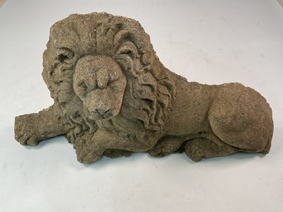 Lot 699 - A reconstituted concrete lion, height 35.5cm,...