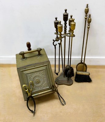 Lot 138 - A brass fireside companion set, together with...