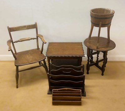 Lot 689 - A oak low two tiered table with barley twist...