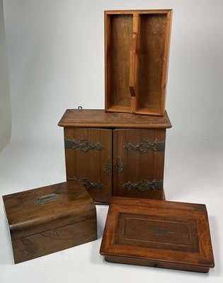 Lot 685 - An oak table top cupboard, having panelled...
