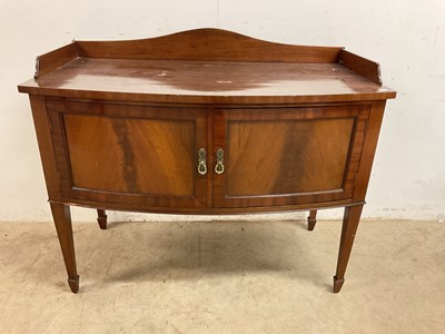 Lot 801 - A small two door bowfronted sideboard with...