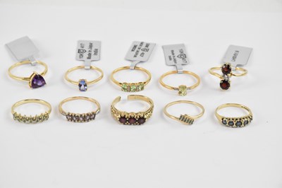 Lot 874 - Eight 10ct yellow gold rings set with...