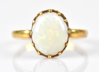 Lot 505 - A 22ct yellow gold dress ring, set with an...