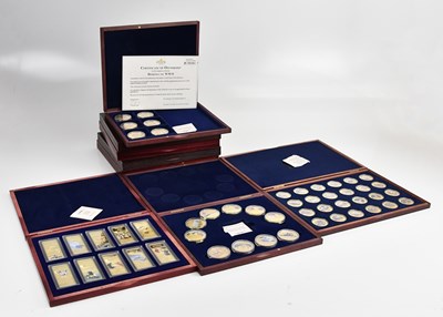 Lot 570 - A collection of cased commemorative coin sets...