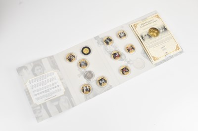 Lot 558 - A 'Her Majesty A Life in Pictures' part coin...