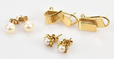 Lot 205 - Two pairs of 9ct yellow gold pearl ear studs,...