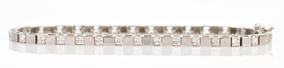 Lot 85 - A 9ct white gold cubic zirconia set tennis...