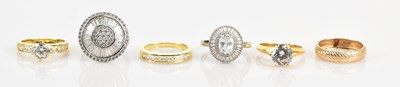 Lot 638 - A 9ct yellow textured gold wedding band, size...