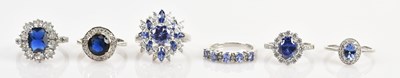 Lot 642 - Five sterling silver dress rings, sizes N, O,...