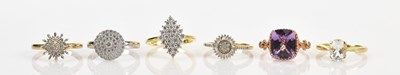 Lot 644 - Six sterling silver dress rings, including a...