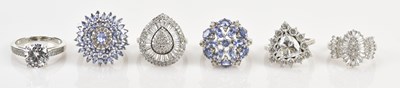 Lot 646 - Six sterling silver dress rings, sizes O (x 3),...
