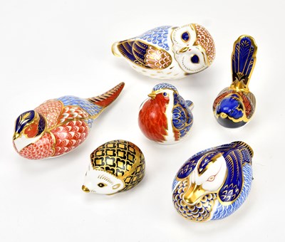 Lot 1322 - ROYAL CROWN DERBY; six Imari paperweights, to...