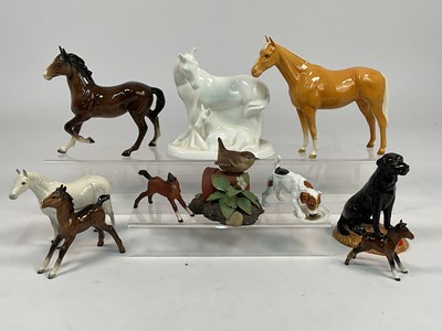 Lot 215 - ROYAL DOULTON AND BESWICK; a quantity of...