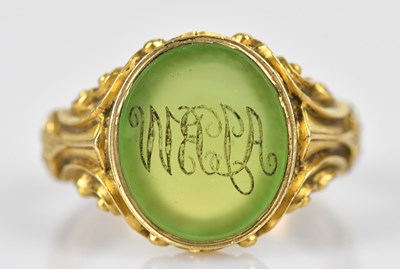 Lot 597 - A 19th century seal ring, the green stone with...