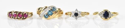 Lot 601 - Four 9ct yellow gold dress rings, including...