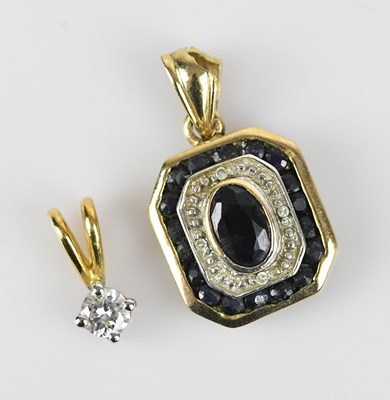 Lot 345 - An 18ct yellow gold diamond set pendant,...