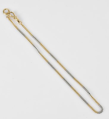 Lot 1102 - An 18ct yellow and white gold Albert chain,...