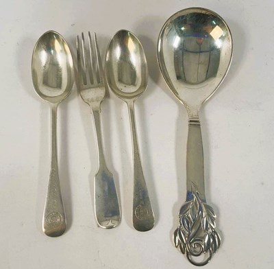 Lot 581 - Two hallmarked silver spoons, London 1909 and...