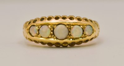 Lot 461 - An Edwardian 18ct gold and opal ring,...