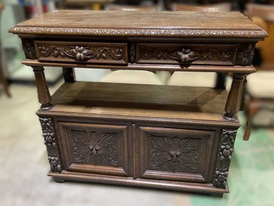Lot 667 - A French Renaissance Revival carved oak buffet,...