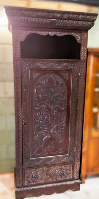 Lot 644 - A late 19th century carved oak bonnetiere,...
