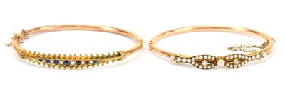 Lot 676 - A Victorian yellow metal seed pearl hinged...