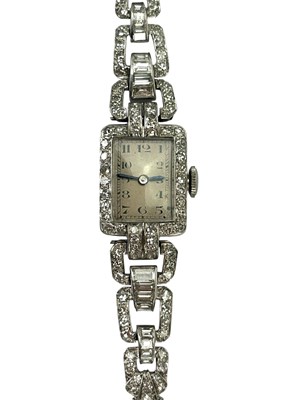Lot 1028 - An Art Deco white metal cocktail watch set...