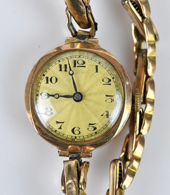 Lot 1201 - A 9ct yellow gold lady's Art Deco cocktail...