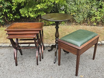 Lot 22 - A nest of three modern mahogany X-frame tables...