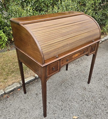 Lot 46 - An Edwardian-style mahogany tambour-fronted...