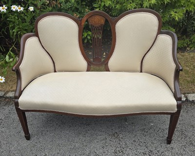 Lot 48 - An Edwardian two-seater sofa with pierced...