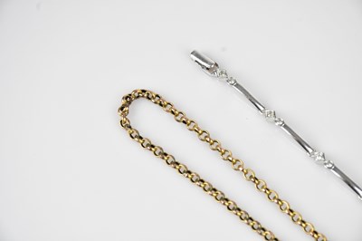 Lot 32 - A white metal bracelet set with clear stones,...